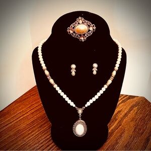 1928 Vintage Gold earrings featuring a small pink stone and faux pearl bead.